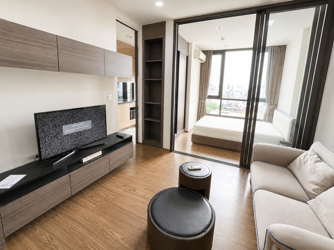 Glass-walled bedroom, open outlook — The Line Sukhumvit 71 photo 1