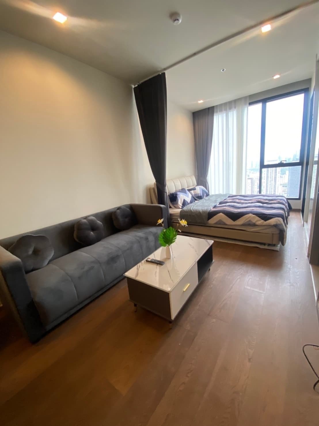 High-floor open-plan 1BR with city view — IDEO Q Victory